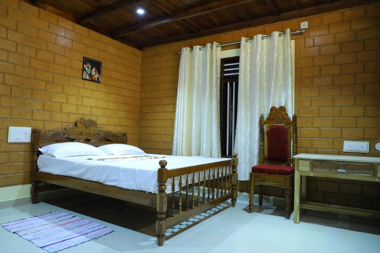 The Munroe Vibes Inn Mundrothuruth 外观 照片